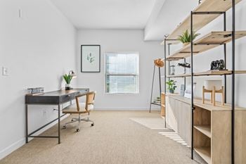 Furnished room with desk and chair